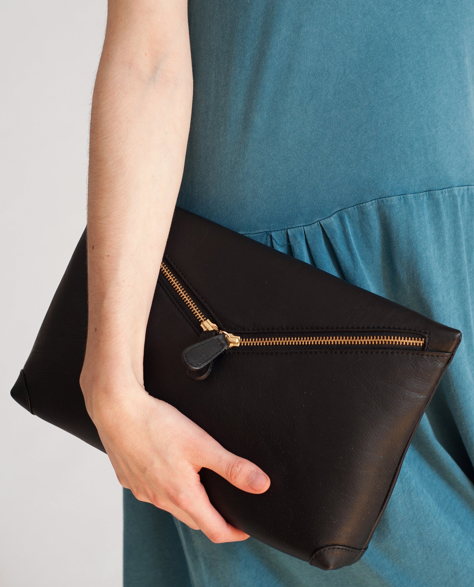 VALENCIA Leather Zip Clutch In Black