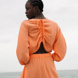 Ezili Organic Cotton Dress in Apricot by HANNAH BEAUMONT