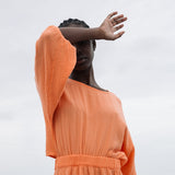 Ezili Organic Cotton Dress in Apricot by HANNAH BEAUMONT