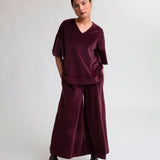 Gabrielle Organic Cotton Velour Trousers In Mauve